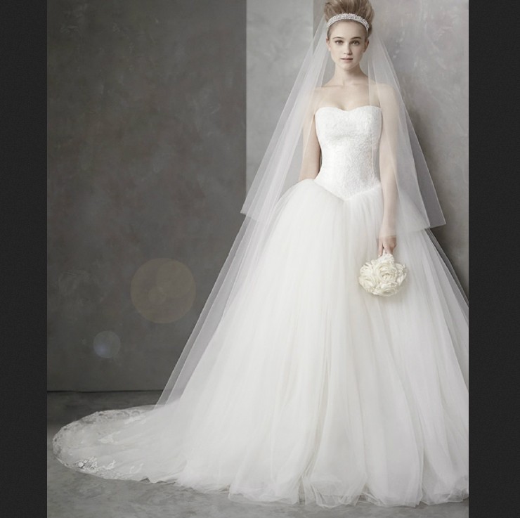 White_Sleeveless_Ball_Organza_Beaded_Princess_Wedding_Dresses_1.jpg